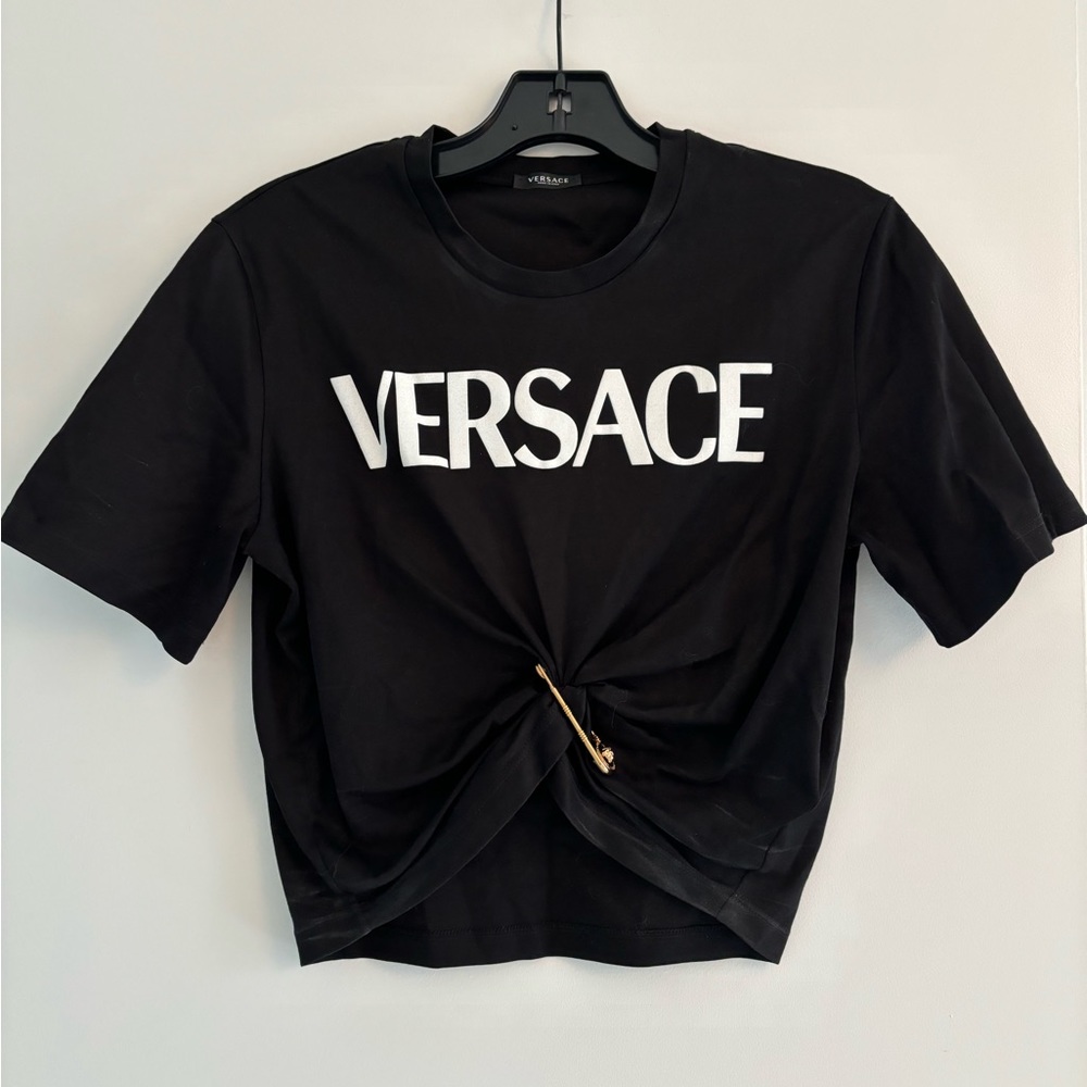 Black crop Versace t shirt .Super cool graphic on back. Classic Versace gold pin